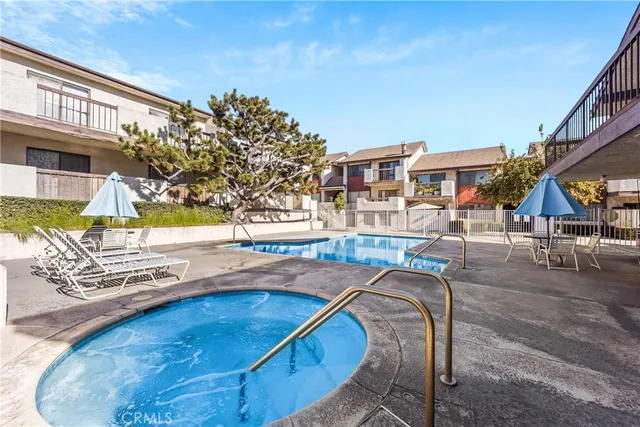 a view of a building with a swimming pool
