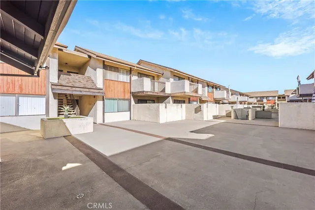 a view of park with large trees