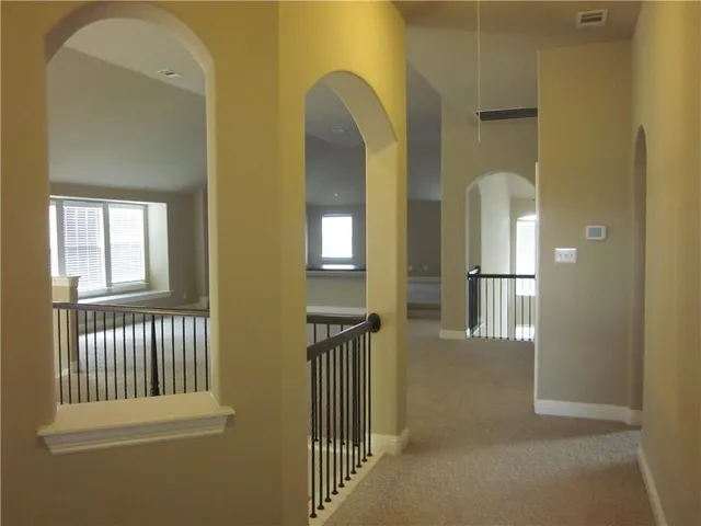 a view of a backyard with green space