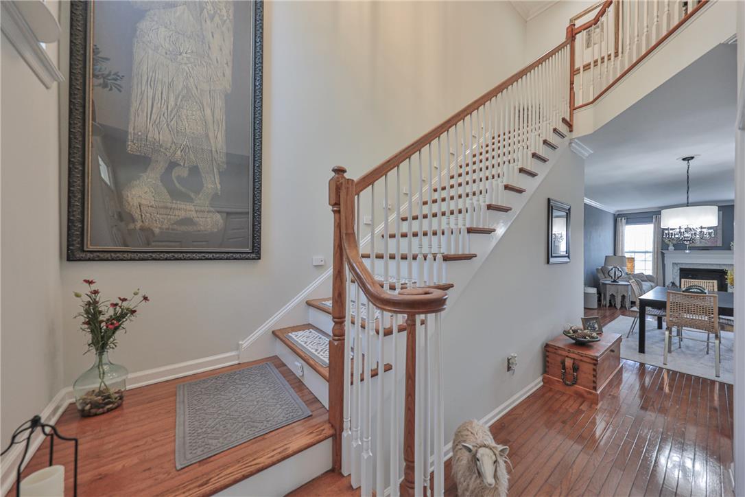 163 Muirfield Way Easton, PA 18042 - Photo 4 of 48 a view of entryway with wooden floor and a chandelier