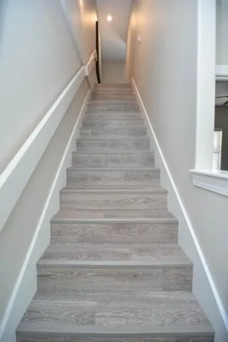 a view of a balcony with furniture