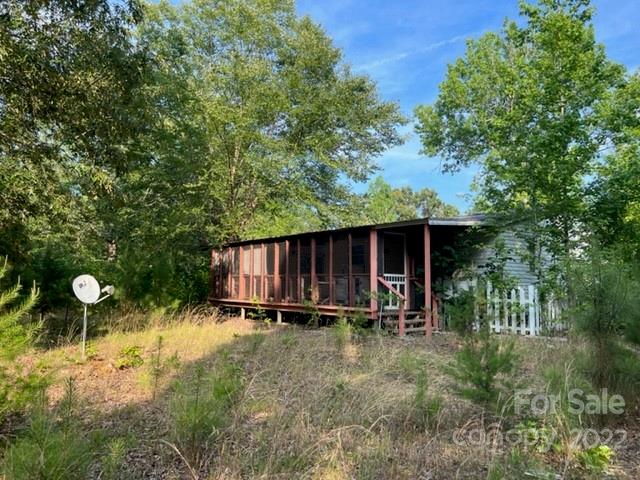 270 Adams Road Rutherfordton, NC 28139 - Photo 1 of 31 a backyard of a house with bicycles parked and entertaining space