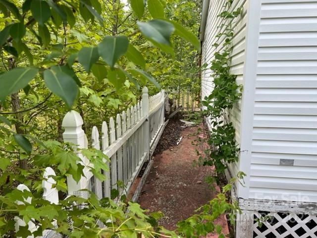 270 Adams Road Rutherfordton, NC 28139 - Photo 4 of 31 a balcony with flower in a garden