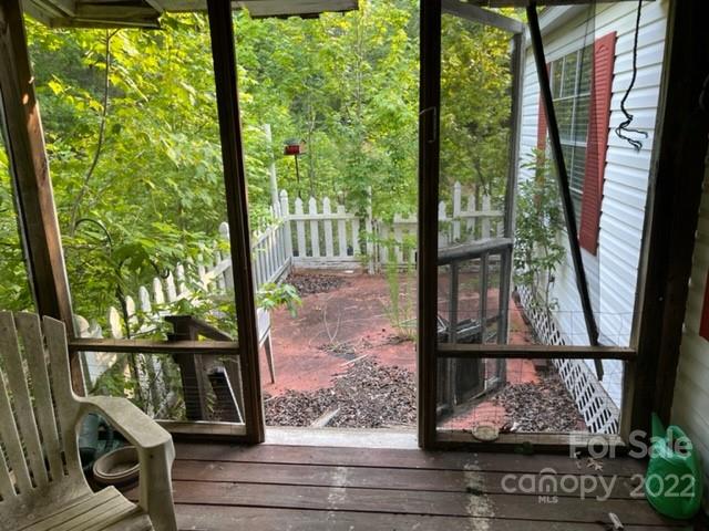 270 Adams Road Rutherfordton, NC 28139 - Photo 8 of 31 a view of a porch with wooden floor