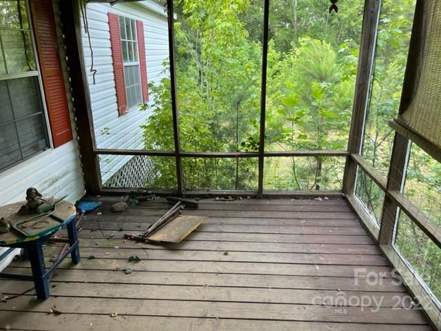 270 Adams Road Rutherfordton, NC 28139 - Photo 9 of 31 a view of a balcony with wooden floor and stairs