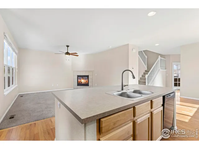 a view living room with a sink and couch