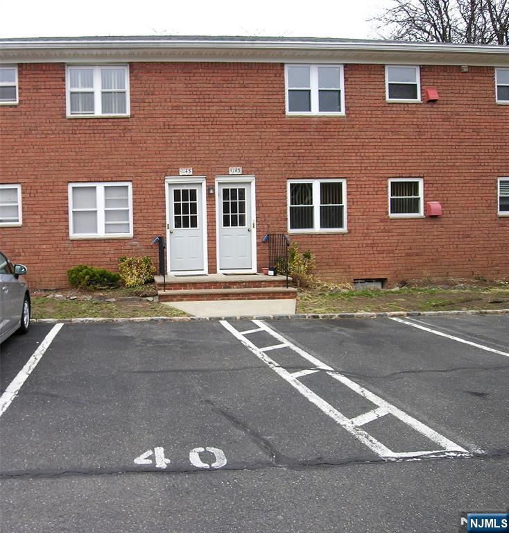 1143 Valley Road, Unit 30 Wayne, NJ 07470 - Photo 2 of 17 a view of a house with a patio