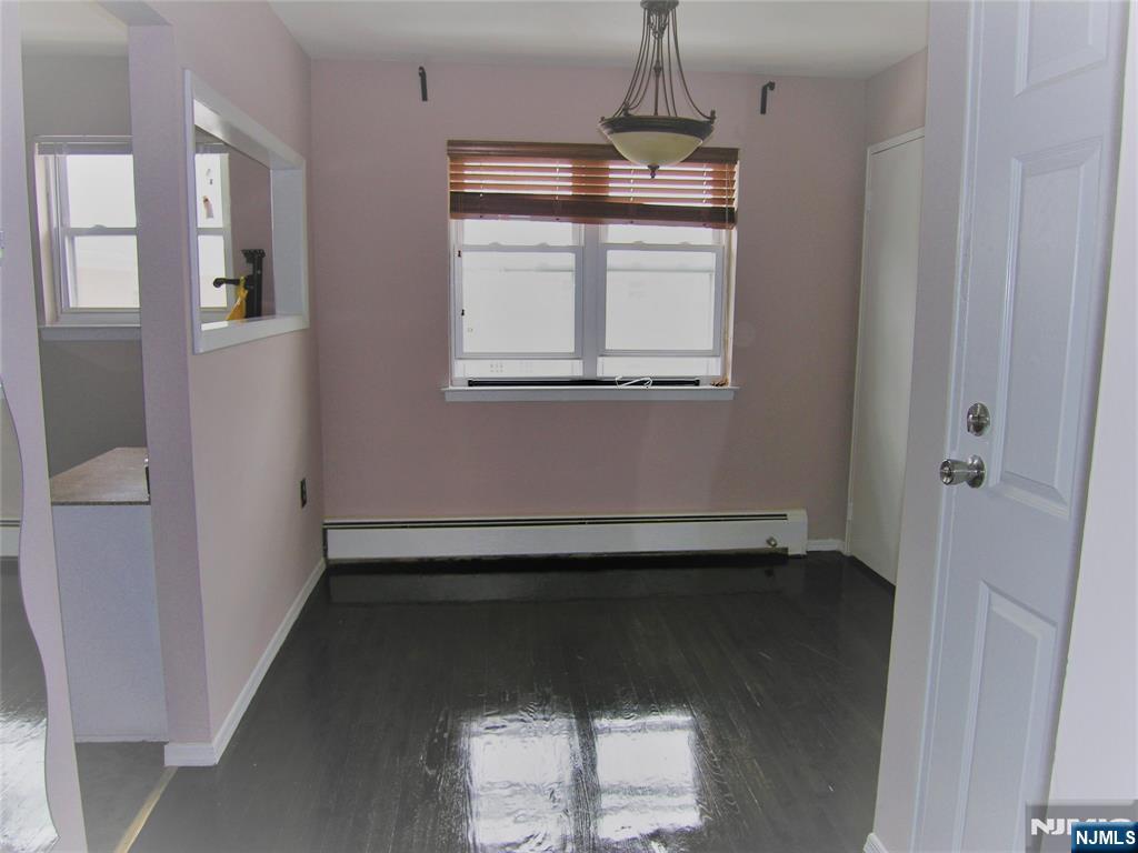 1143 Valley Road, Unit 30 Wayne, NJ 07470 - Photo 7 of 17 a view of empty room with window