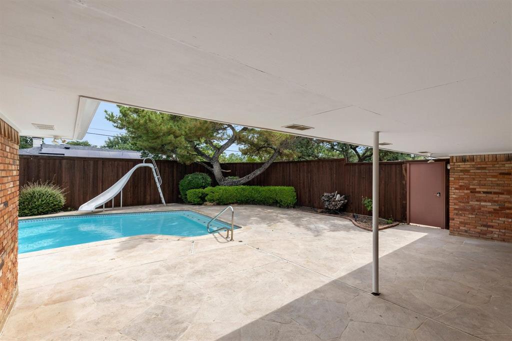 4446 Thunder Road Dallas, TX 75244 - Photo 27 of 30 Covered patio with a concrete surface, providing ample outdoor living space