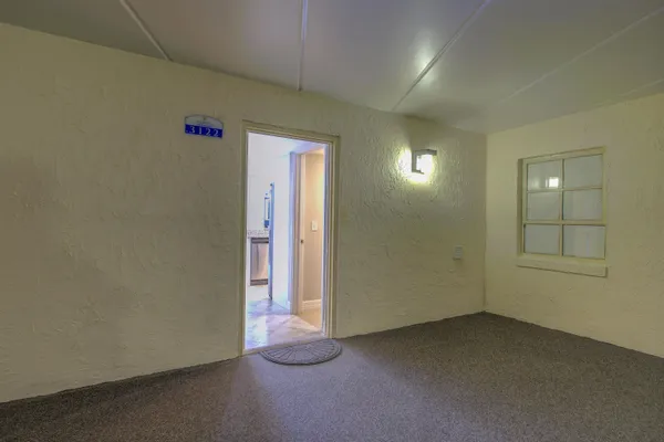 an empty room with windows