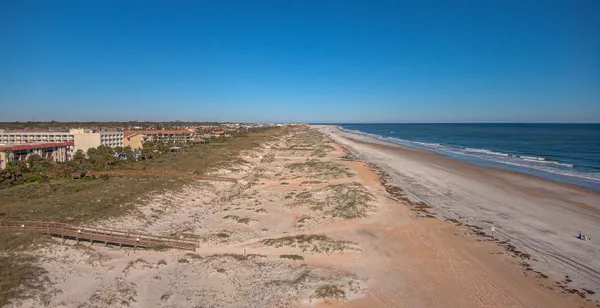 a view of empty field with beach