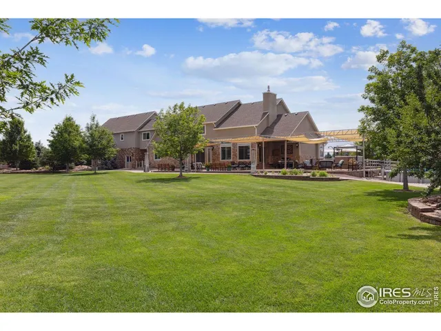 a view of a house with a big yard