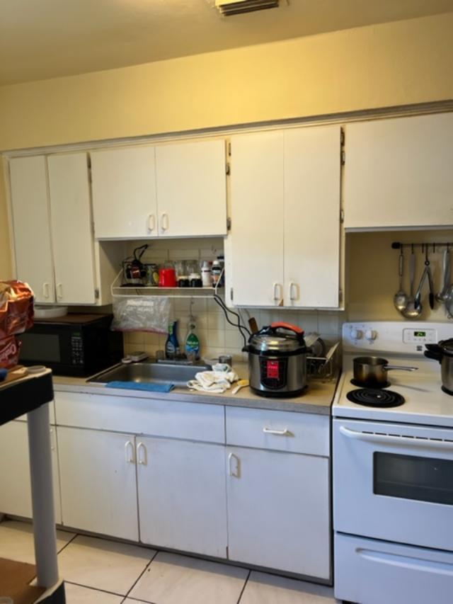2115-2117 Southwest 19th Terrace Miami, FL 33145 - Photo 10 of 35 2115 Kitchen