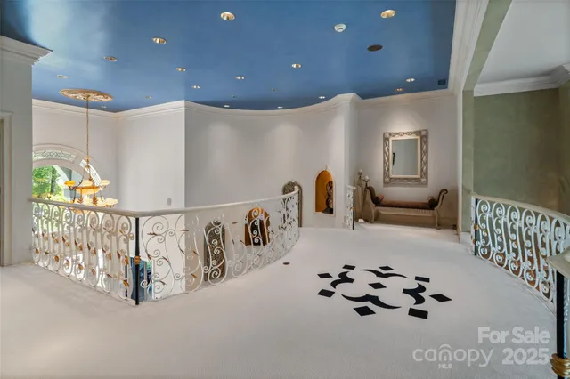 a bed room with furniture and white walls