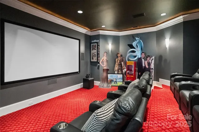 a kitchen with stainless steel appliances kitchen island granite countertop a sink and cabinets