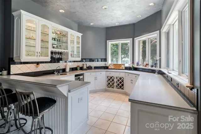 a living room with furniture fireplace and a flat screen tv