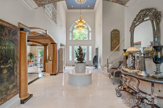 a living room with fireplace furniture and a window