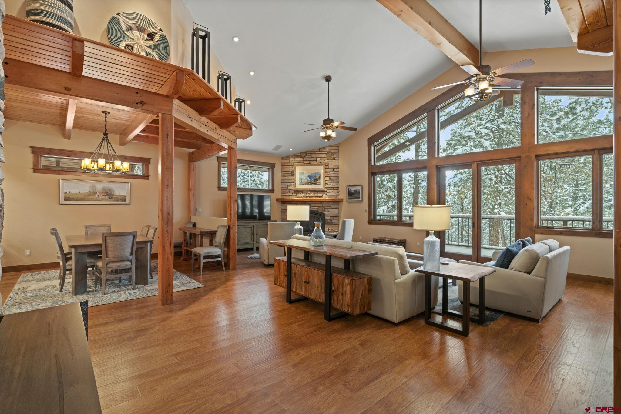 680 The Golden Dipper Road Durango, CO 81301 - Photo 2 of 35 a living room with furniture and a large window
