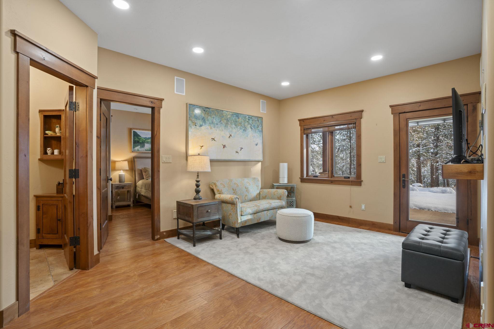680 The Golden Dipper Road Durango, CO 81301 - Photo 27 of 35 a living room with furniture and a large window
