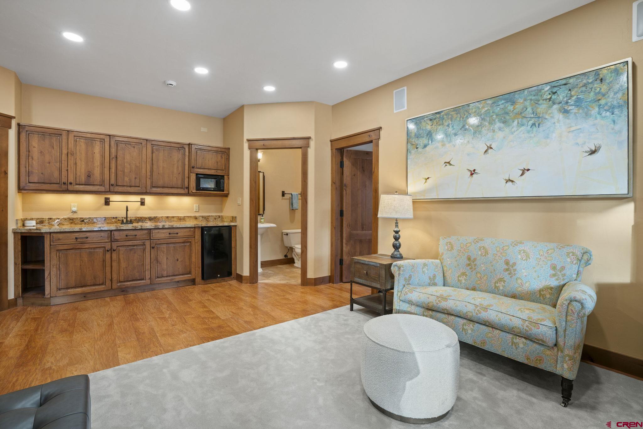 680 The Golden Dipper Road Durango, CO 81301 - Photo 28 of 35 a living room with furniture and a large window
