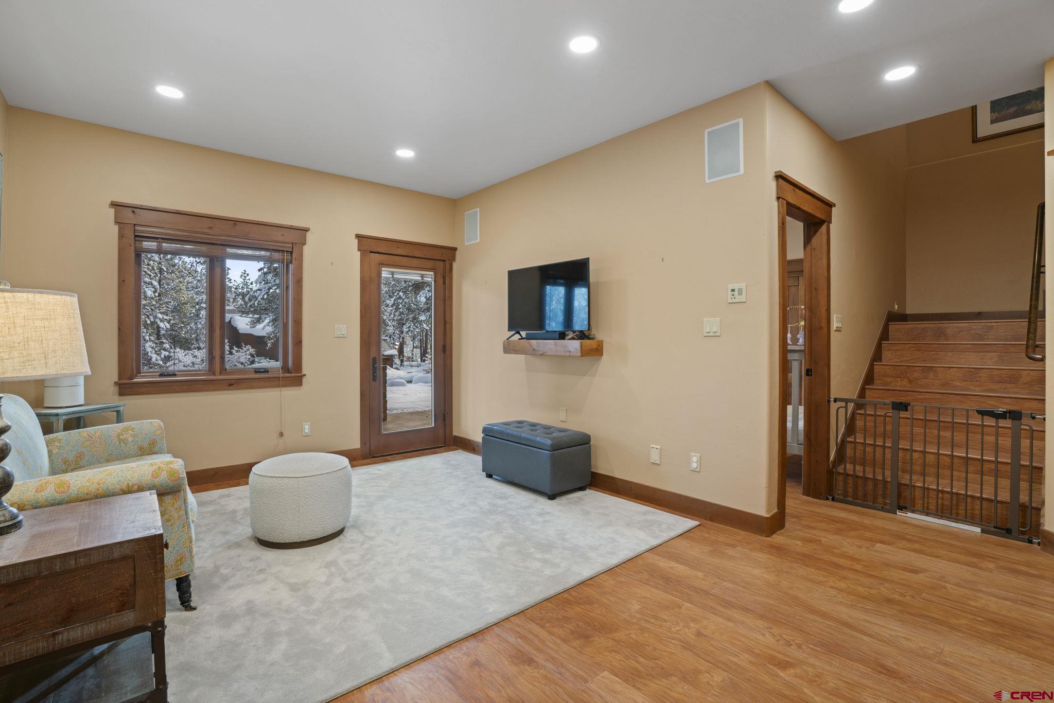 680 The Golden Dipper Road Durango, CO 81301 - Photo 29 of 35 a living room with furniture and a wooden floor