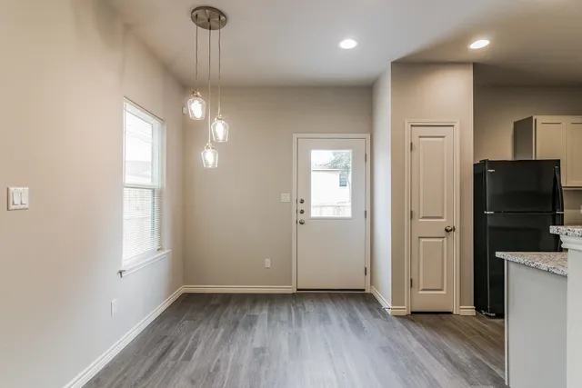 a bathroom with a sink a mirror and shower