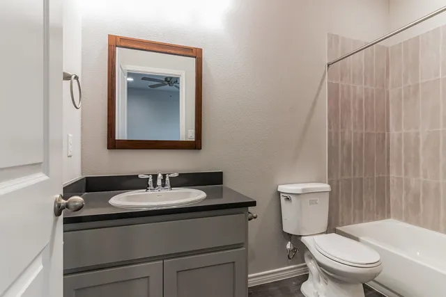 a bathroom with a shower and a bathtub