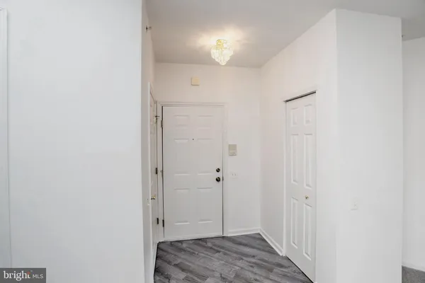 a view of a bathroom with a sink and a mirror