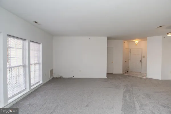 an empty room with windows