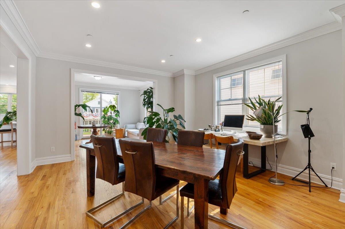 545 East Fulton Street Long Beach, NY 11561 - Photo 11 of 41 Dining area with light wood-type flooring, crown molding, and recessed lighting