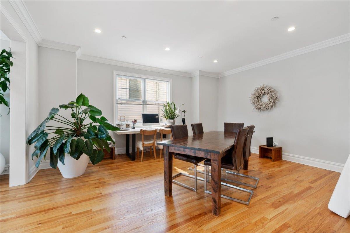 545 East Fulton Street Long Beach, NY 11561 - Photo 12 of 41 Dining area with light wood-style flooring, ornamental molding, recessed lighting, and a desk