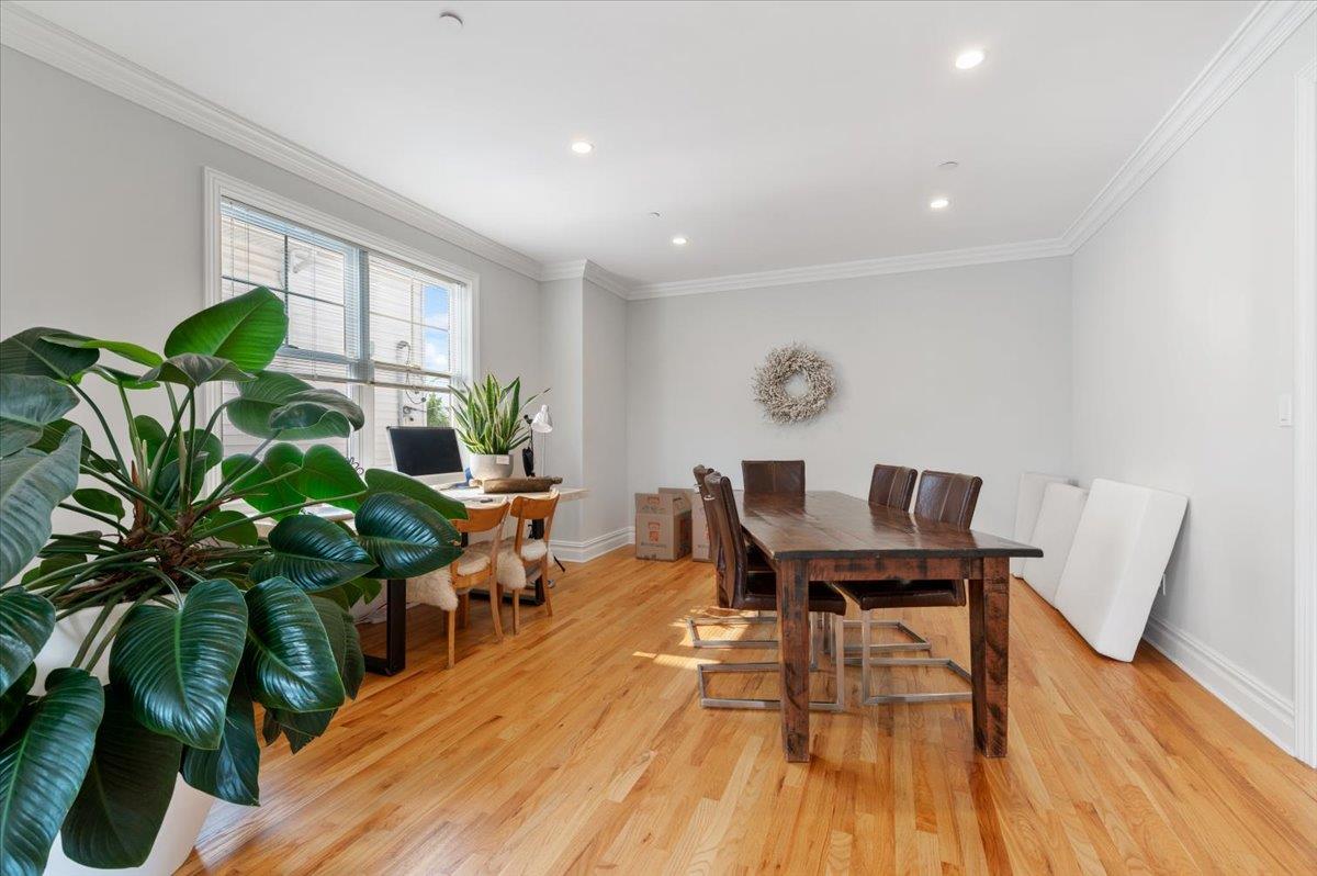 545 East Fulton Street Long Beach, NY 11561 - Photo 13 of 41 Dining area with light wood-type flooring, ornamental molding, and recessed lighting
