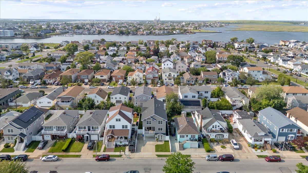 545 East Fulton Street Long Beach, NY 11561 - Photo 36 of 41 Aerial view of residential area with a nearby body of water