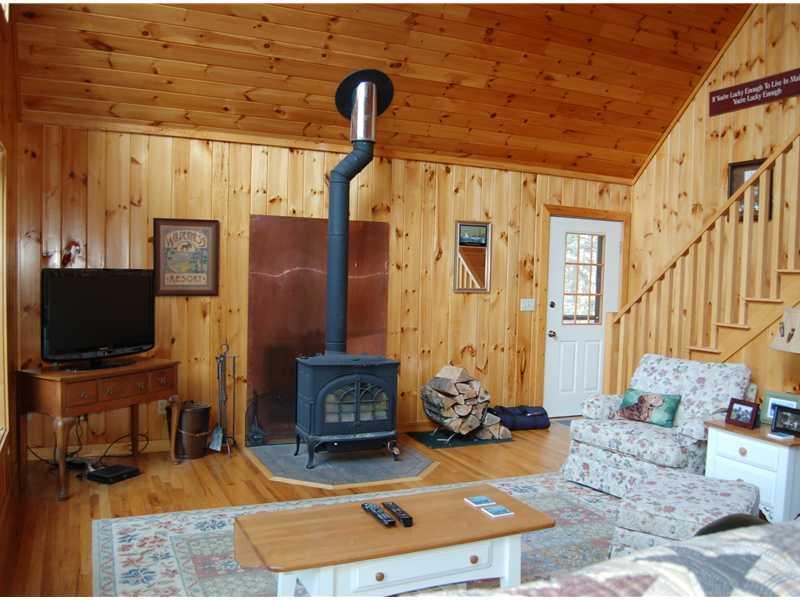 176 Sandy Cove Road Belgrade, ME 04917 - Photo 6 of 25 Living Room.