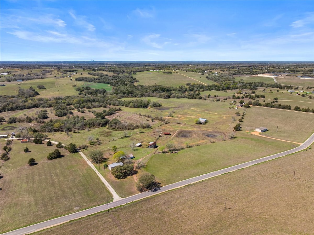 5079 Skull Creek Road Fayetteville, TX 78940 - Photo 13 of 15 an aerial view of residential houses with outdoor space