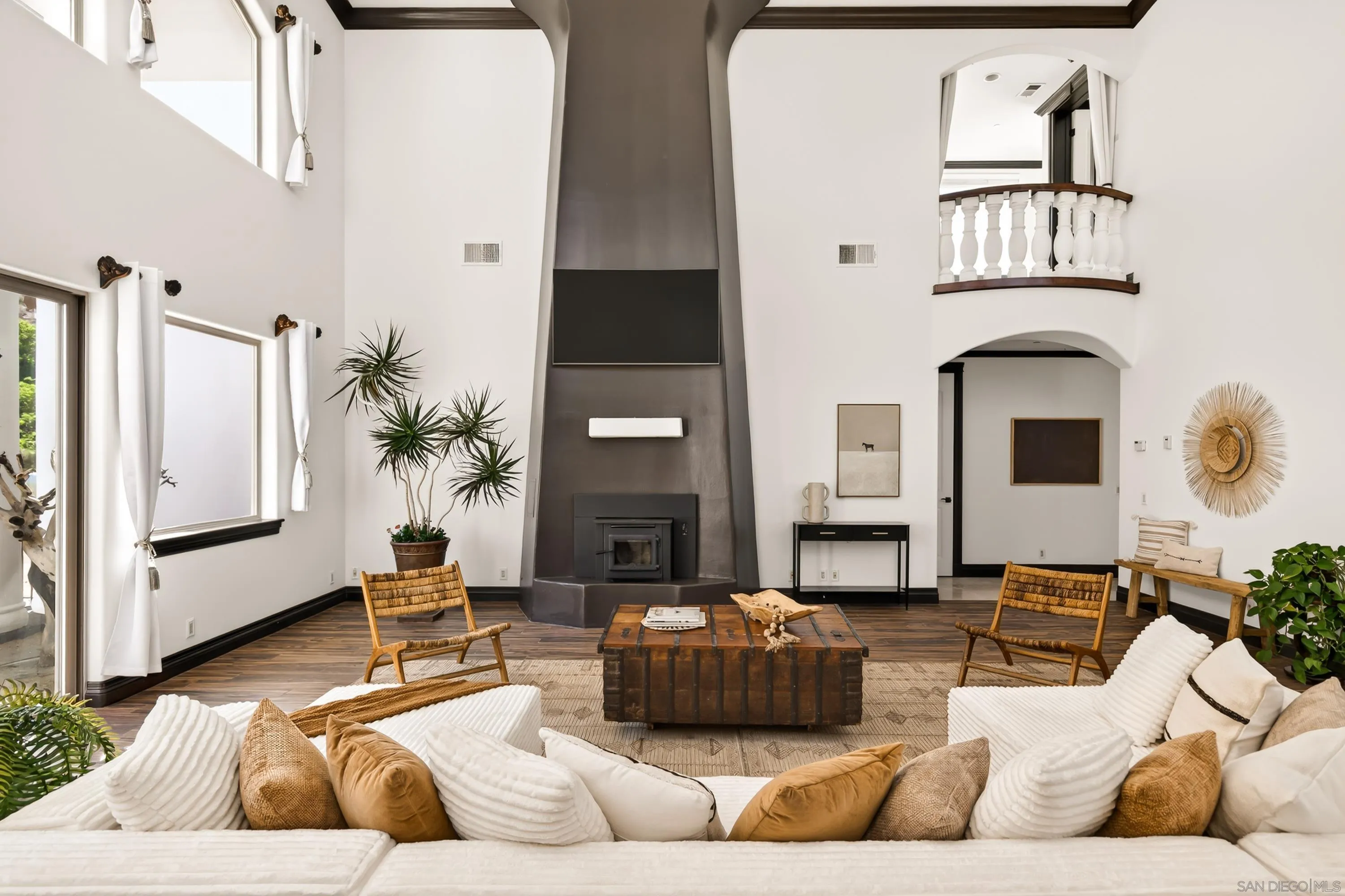 8022 Wesley Road Joshua Tree, CA 92252 - Photo 14 of 69 a living room with furniture and a fireplace