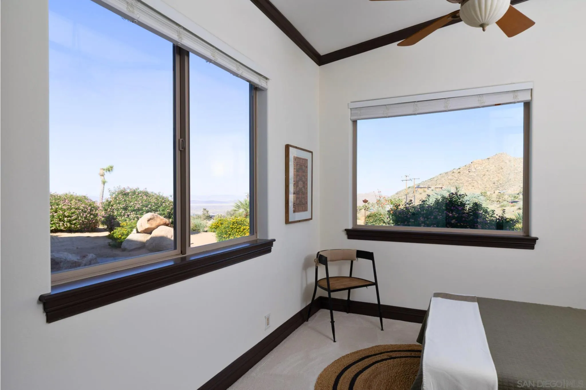 8022 Wesley Road Joshua Tree, CA 92252 - Photo 27 of 69 a view of a balcony with furniture and front door