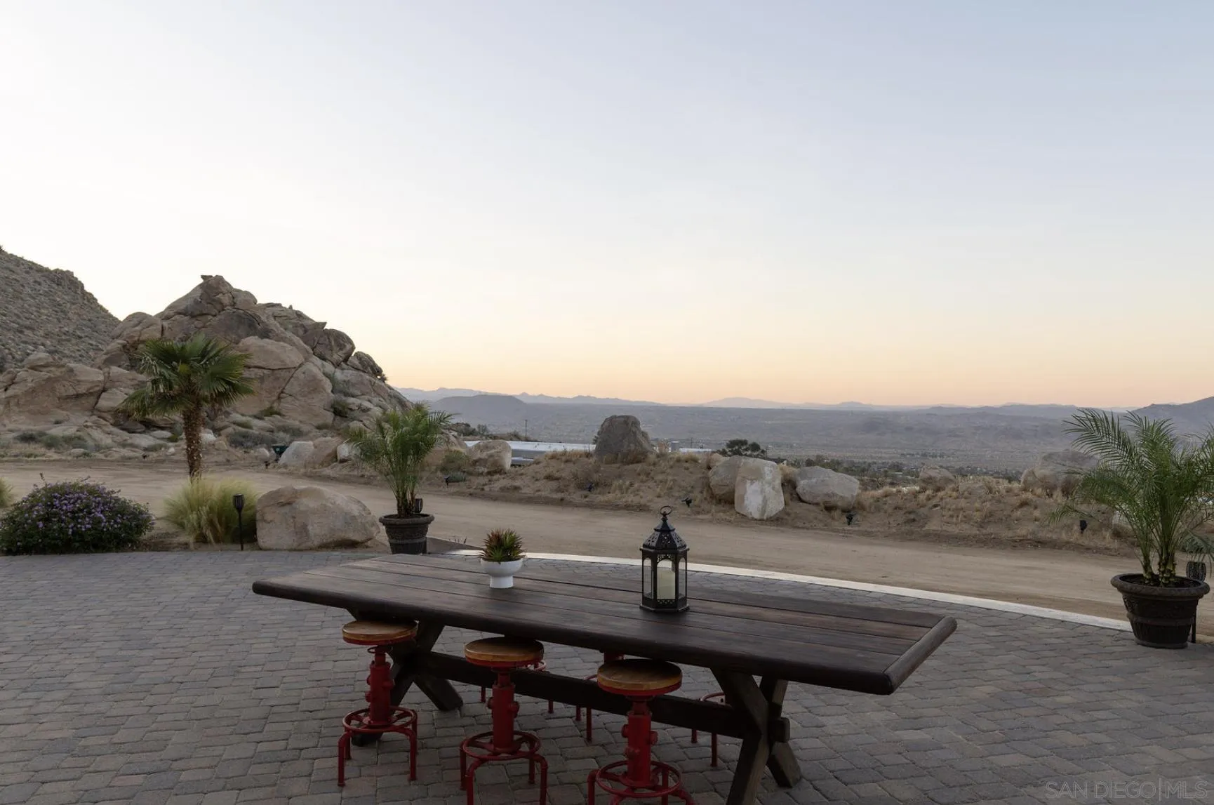 8022 Wesley Road Joshua Tree, CA 92252 - Photo 29 of 69 a view of city from terrace with seating space