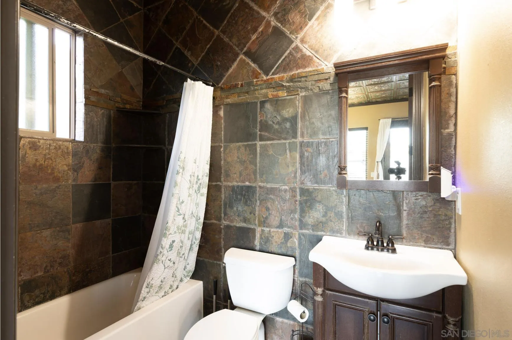 8022 Wesley Road Joshua Tree, CA 92252 - Photo 46 of 69 a bathroom with a sink mirror toilet and shower