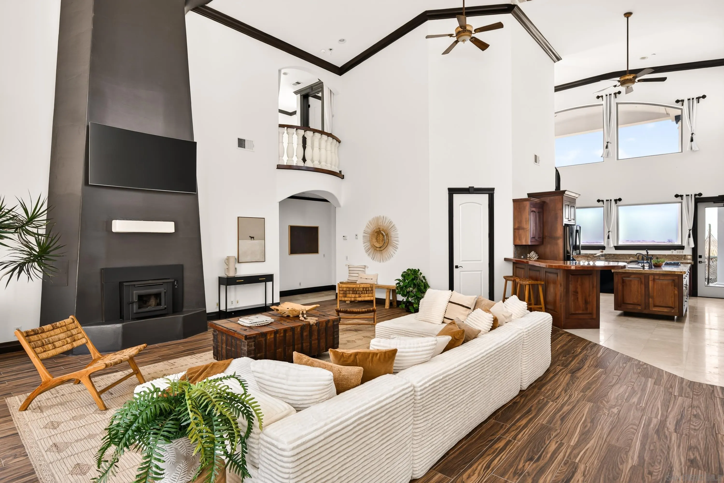 8022 Wesley Road Joshua Tree, CA 92252 - Photo 6 of 69 a living room with furniture fireplace and flat screen tv