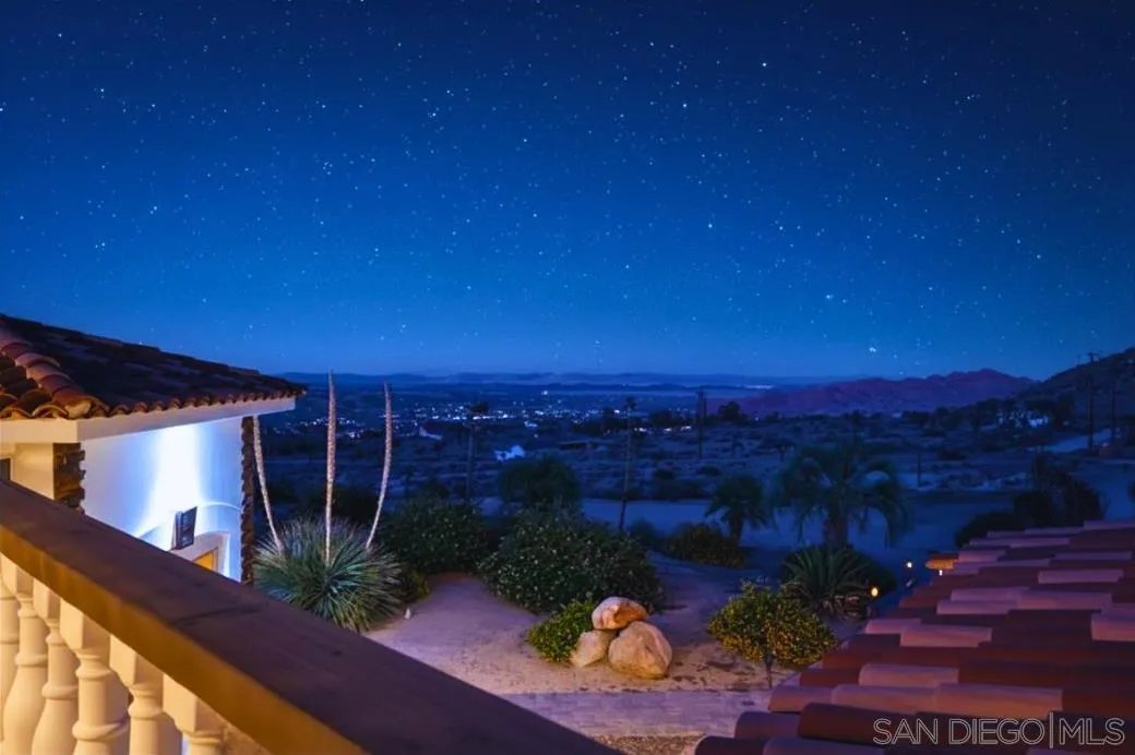 8022 Wesley Road Joshua Tree, CA 92252 - Photo 65 of 69 a view of a balcony with an outdoor space