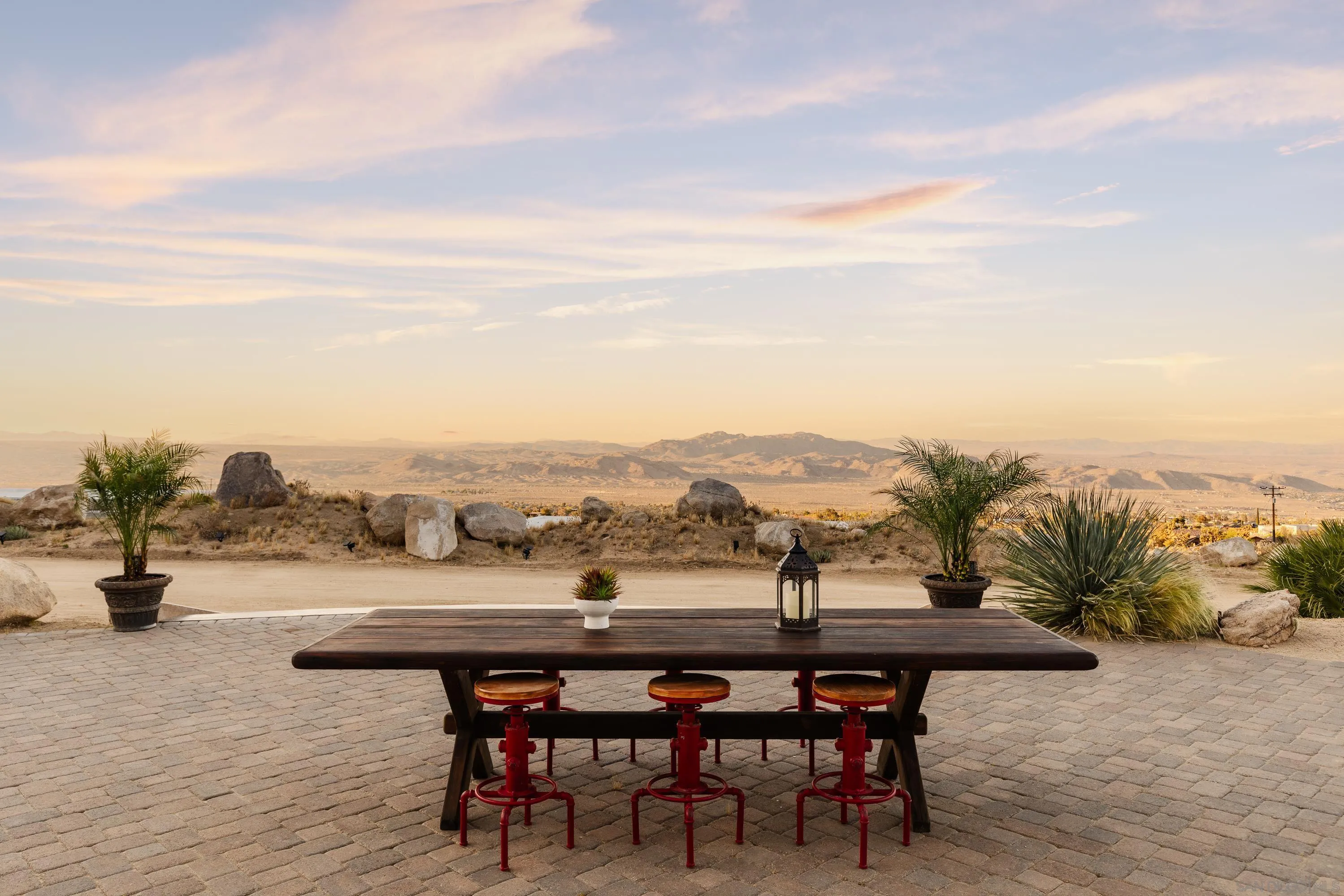 8022 Wesley Road Joshua Tree, CA 92252 - Photo 9 of 69 a view of a terrace with furniture and stove