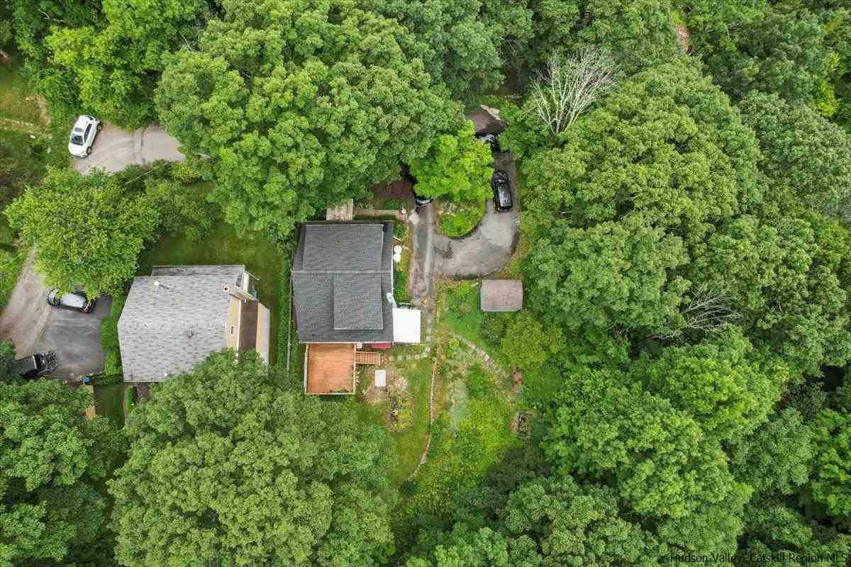 36 Cooper Road Monroe, NY 10950 - Photo 25 of 25 an aerial view of a house with a yard and large trees