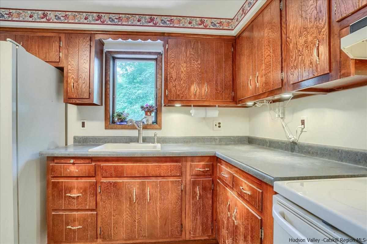36 Cooper Road Monroe, NY 10950 - Photo 6 of 25 a kitchen with stainless steel appliances granite countertop a sink and a cabinets