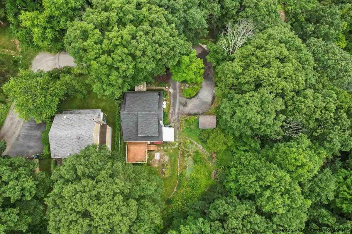 36 Cooper Road Monroe, NY 10950 - Photo 9 of 25 an aerial view of a house with a yard