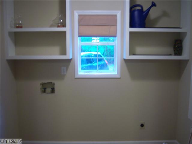1286 Gray Road Lexington, NC 27292 - Photo 4 of 14 Laundry Room. oversized laundry room with floating floors off kitchen