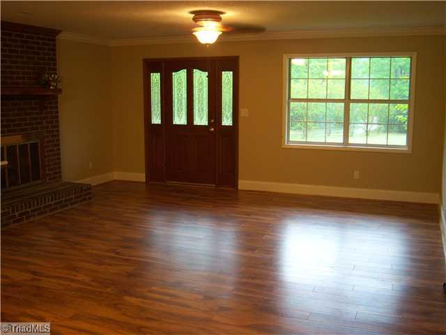 1286 Gray Road Lexington, NC 27292 - Photo 6 of 14 Living Room. LR has brick fireplace w/ gas logs