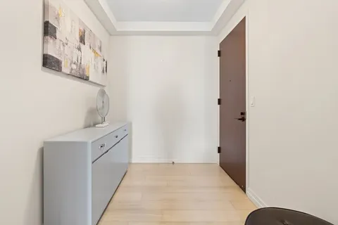 a picture of a book and a white wall