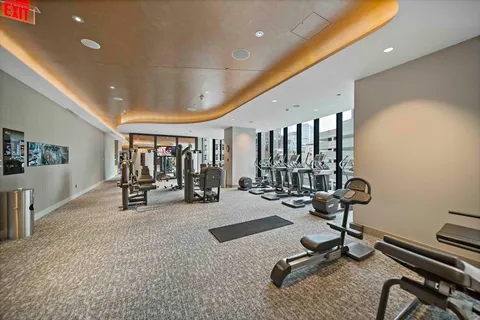 a very nice looking living room with furniture and a flat screen tv