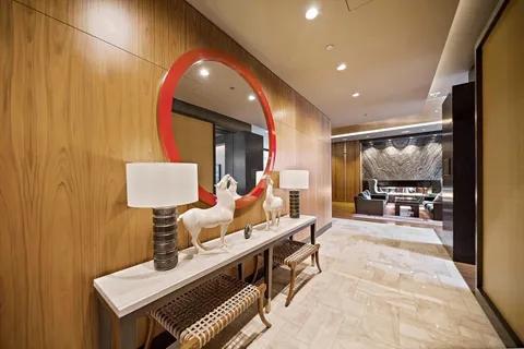 a view of a building with car parked